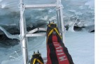 My feet on a ladder on the Cwm icefall