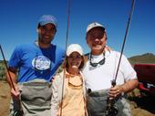 Three extremely satisfied fly-fisherman