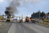 Blocked road­ with burning debris